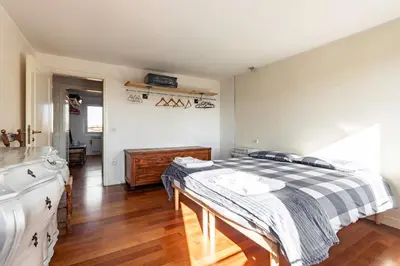 Letto o letti in una camera di GuestHost - Affaccio sul Brenta - bright apartment in Oriago