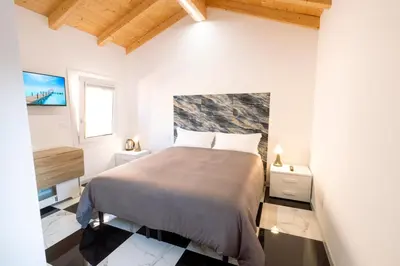 Letto o letti in una camera di Celeste Charme Rooms