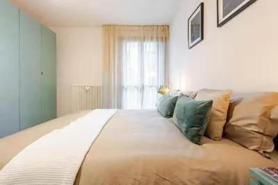 Letto o letti in una camera di Bilocale moderno a Conselve