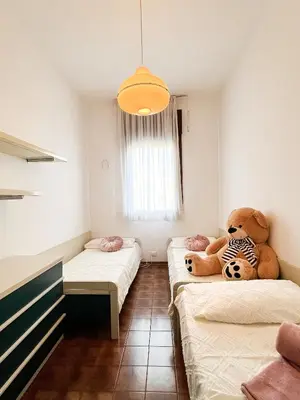 Letto o letti in una camera di Fronte Mare, Piscina - RESIDENCE GRIFONE
