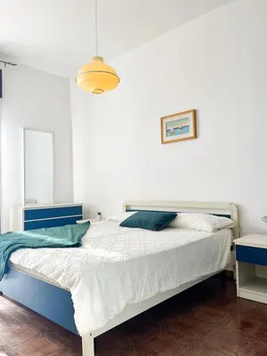 Letto o letti in una camera di Fronte Mare, Piscina - RESIDENCE GRIFONE