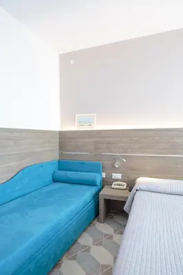 Letto o letti in una camera di Hotel Capri 3 Stelle SUPERIOR