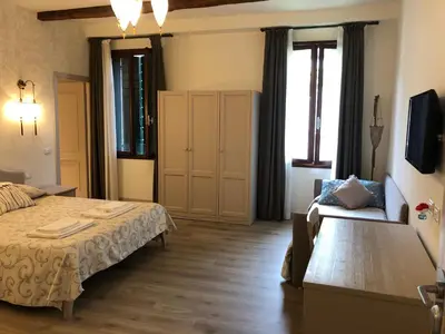 Letto o letti in una camera di Guest House Ca' dell'Angelo