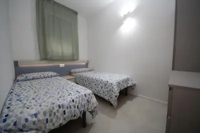 Letto o letti in una camera di Modern apartment in renovated residence in Rosolina