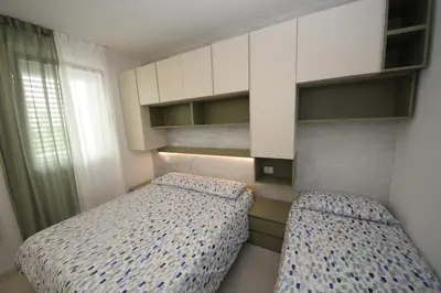 Letto o letti in una camera di Modern and renovated flat with terrace in Rosolina