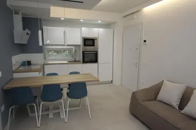 Cucina o angolo cottura di Modern and renovated flat with terrace in Rosolina