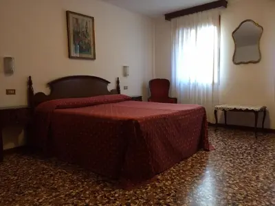 Letto o letti in una camera di Hotel Fontana