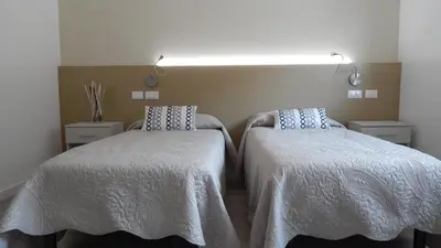 Letto o letti in una camera di Flyingaway
