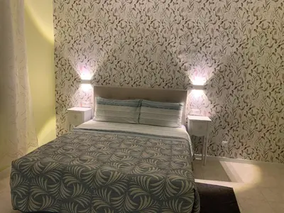 Letto o letti in una camera di Ca' Rosso Venice