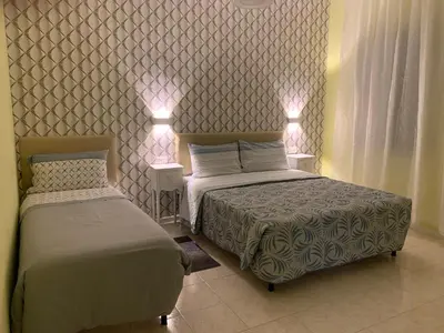 Letto o letti in una camera di Ca' Rosso Venice