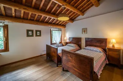 Letto o letti in una camera di Borgo Feriani