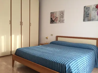 Letto o letti in una camera di Due camere, vicino al mare - CONDOMINIO OLIMPIA