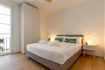 Letto o letti in una camera di Francesco e Giulia - Appartamento n 3
