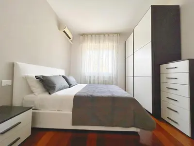 Letto o letti in una camera di Orange apartment