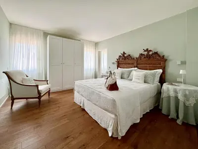 Letto o letti in una camera di B&B Carmen Garden