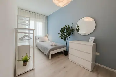 Letto o letti in una camera di Comfort a Padova - WiFi Veloce & Free Parking