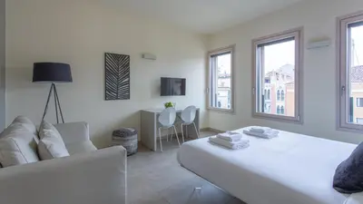 Letto o letti in una camera di Erïk Langer Pedrocchi Suites