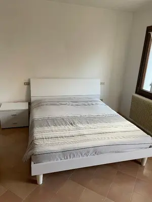 Letto o letti in una camera di Appartamento zona fiera Treviso