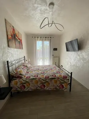 Letto o letti in una camera di Appartamento Laguna