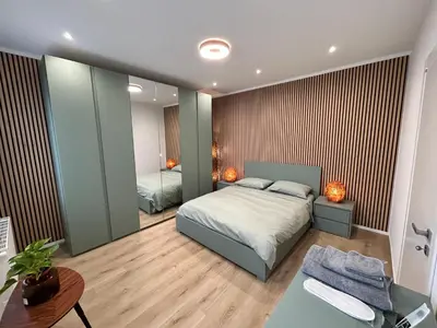 Letto o letti in una camera di Villa Wally