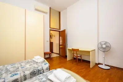 Letto o letti in una camera di Ca' Simonne by Sarlux