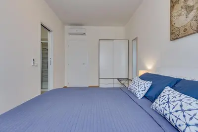Letto o letti in una camera di Rooms Vidar Train Station
