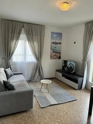 Area soggiorno di Venice grey apartment