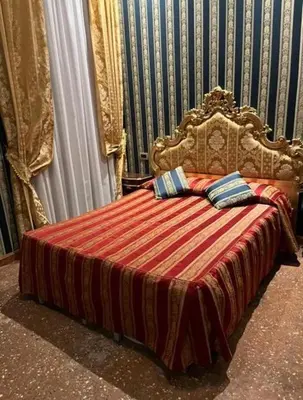 Letto o letti in una camera di Panada L & S