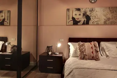 Letto o letti in una camera di I Quattro Mori by Wonderful Italy