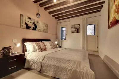 Letto o letti in una camera di I Quattro Mori by Wonderful Italy