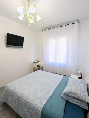 Letto o letti in una camera di Casa Molise