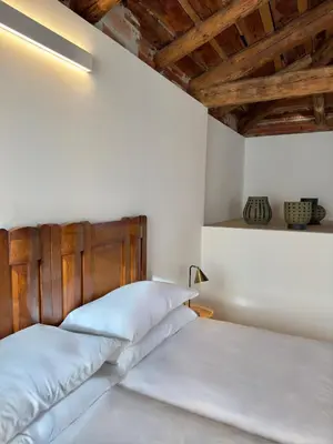 Letto o letti in una camera di LaRIVA