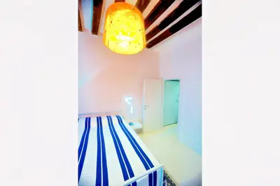Letto o letti in una camera di Ca' Vittoria