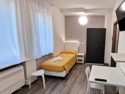 Letto o letti in una camera di Berica Alloggi Turistici