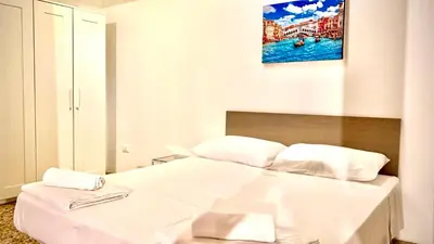Letto o letti in una camera di Bella Venezia