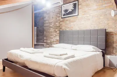 Letto o letti in una camera di Palazzo diedo 1