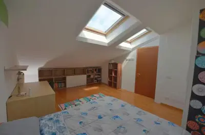 Letto o letti in una camera di Stanza con bagno privato