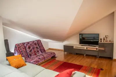 TV o dispositivi per l'intrattenimento presso Stanza con bagno privato