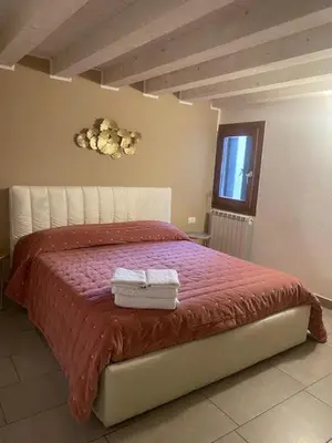 Letto o letti in una camera di Elena's Home piano terzo