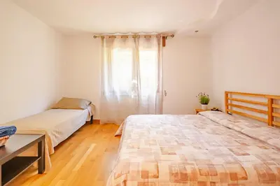 Letto o letti in una camera di Appartamento comodo per visitare Padova e Venezia
