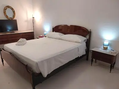 Letto o letti in una camera di Appartamento Margherita