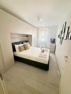 Letto o letti in una camera di Suite Piazzetta Vigo