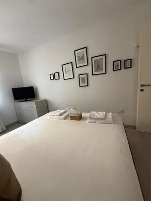 Letto o letti in una camera di Suite Piazzetta Vigo