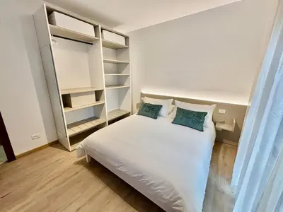 Letto o letti in una camera di Palladium Cozy Suite Close to downtown and Exibition Center