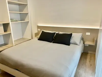 Letto o letti in una camera di Palladium Cozy Suite Close to downtown and Exibition Center