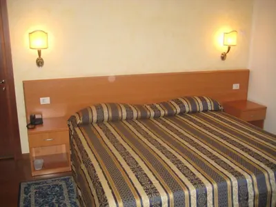 Letto o letti in una camera di Hotel Ristorante Dotto