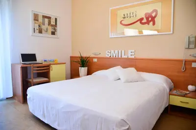 Letto o letti in una camera di Hotel Domingo