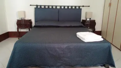 Letto o letti in una camera di Appartamento Corte Zappa