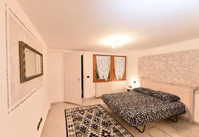 Letto o letti in una camera di San Marco Wi-Fi