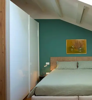Letto o letti in una camera di Le Mura Minicase int 4